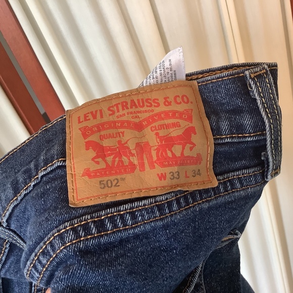 Levi’s 502 Mens Blue Denim Jeans Taper Leg Size 33x34 Stretch - Picture 6 of 7